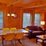 Relax or sit down to dinner in the living and dining area. Left Unit: Living Room and Dining Area